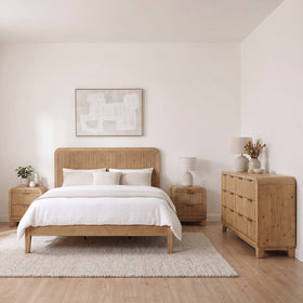 Ollie 4 Piece Dresser Bedroom Suite in natural reclaimed pine, styled in a bright bedroom