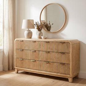 Ollie reclaimed pine 6 drawer dresser in a bright bedroom