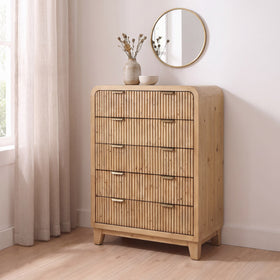Ollie reclaimed pine 5 drawer tallboy in a bright bedroom