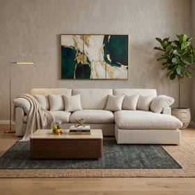 Modern living room with a beige sectional sofa, wooden coffee table, and abstract art on the wall.