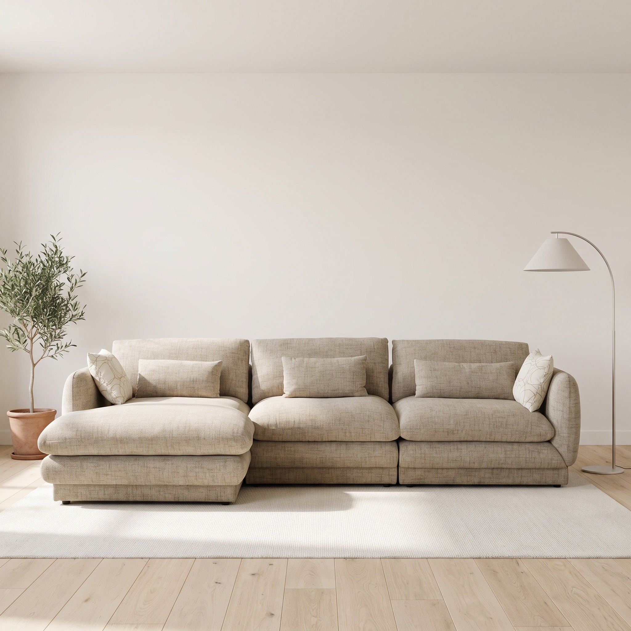 Otway L-Shaped Fabric Lounge in Beige styled in a living room, right-hand chaise