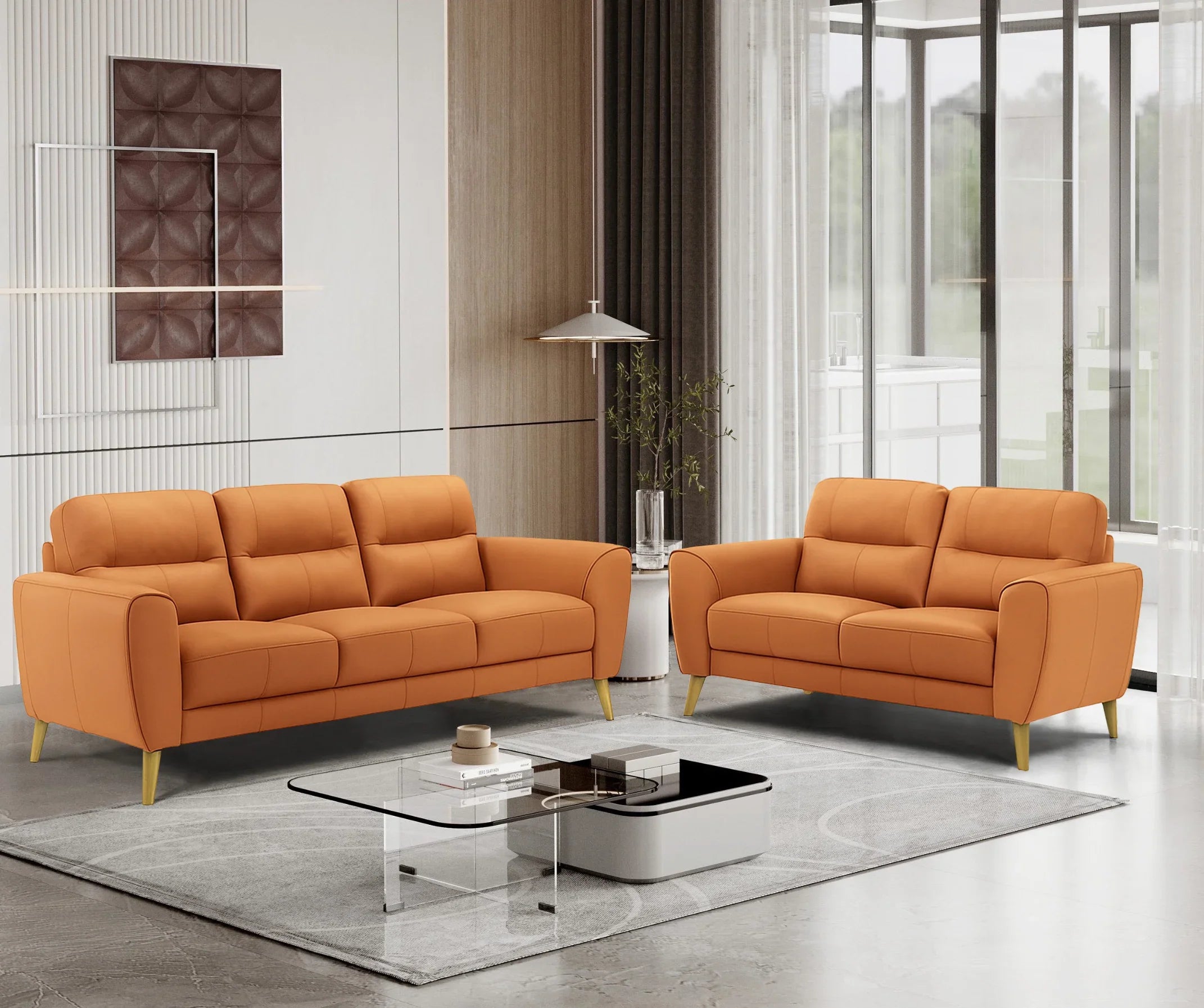Modern orange sofa set in a contemporary living room with large windows and minimalist décor