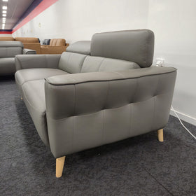 Close view of the Penelope 3 Seater Leather Lounge in Anthracite showing arm stitching and a raised headrest, at The A2Z Furniture showroom
