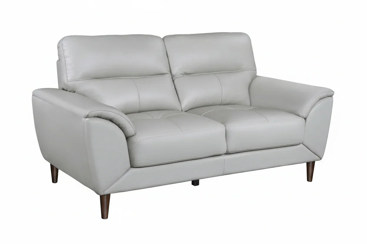 Gray leather sofa on a white background