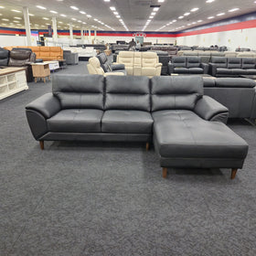 Penrith 3 Seater Leather Sofa with Chaise in black leather, front-on view with the chaise on the left when seated, at The A2Z Furniture showroom