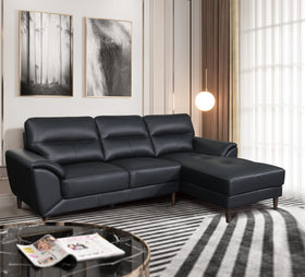 Penrith 3 Seater Leather Sofa with Chaise in black, styled in an elegant living room with framed art and pendant light - The A2Z Furniture