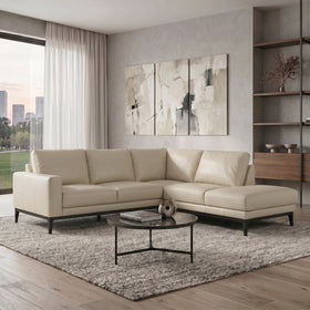 Plenty Leather Chaise Lounge in Light Grey leather styled in a modern living room, left-hand chaise when sitting.