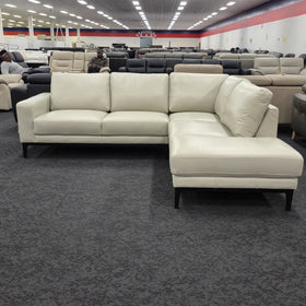 Plenty Leather Chaise Lounge in Light Grey leather, straight-on front view with the left-hand chaise when sitting, in The A2Z Furniture showroom