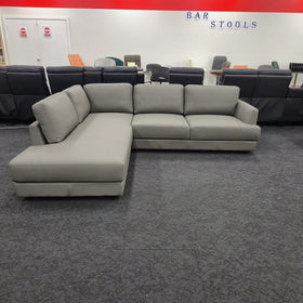Portsea L-Shaped Corner Leather Sofa in light grey leather, front-on view with the chaise on the right when seated, at The A2Z Furniture showroom