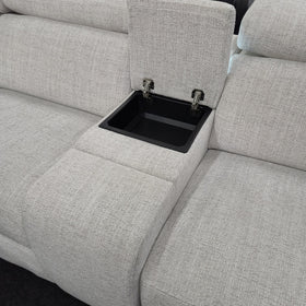 Sandgate Electric Corner Recliner Lounge in light grey fabric with the hinged console lid open revealing the storage compartment