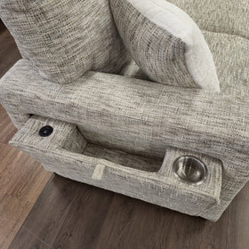 Detail of the Sherwood U-Shaped Sofa Bed arm, showing the recessed cup holder, USB port and storage pocket built into the armrest.