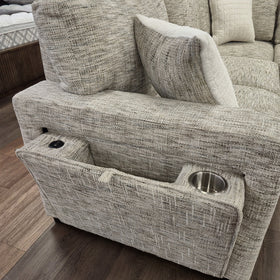 Close-up of the Sherwood U-Shaped Sofa Bed arm console in Beige, showing the USB charging port, stainless steel cup holder and fabric side pocket.