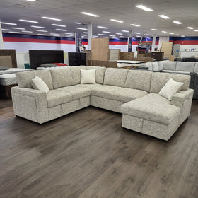 Sherwood U-Shaped Sofa Bed in Beige viewed from a different angle in the showroom, showing both end modules and the corner seating.