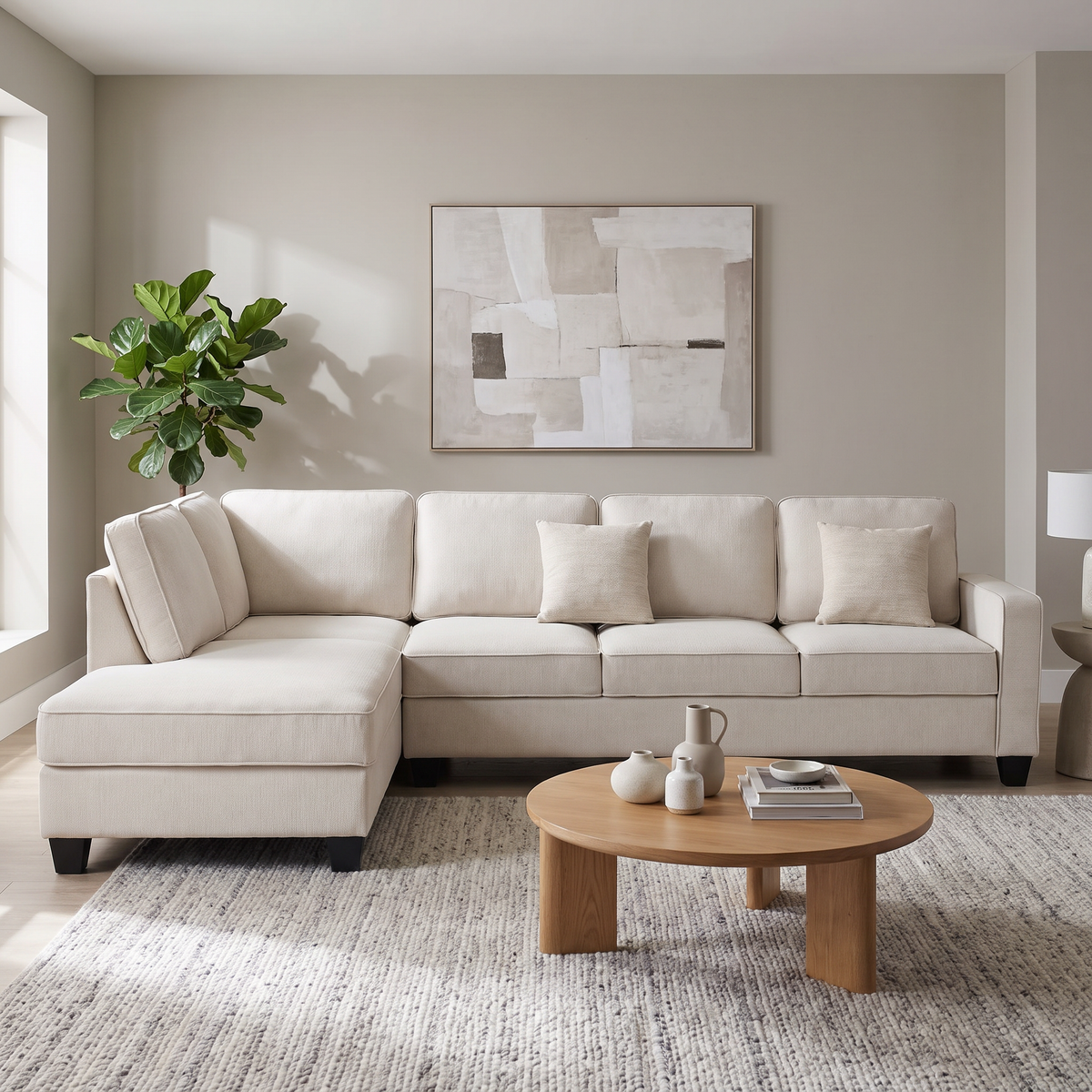 Signature II corner sofa with chaise in beige fabric, chaise on the right when sitting, with two throw cushions, styled in a living room