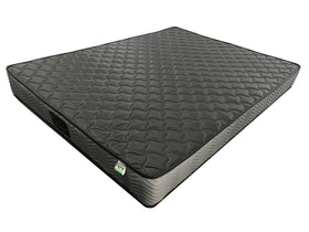 Gray quilted mattress on a white background