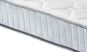 Angled edge view of the Sleep Rest Bonnell spring mattress highlighting the padded quilted top and silver-grey panel sides with piped trim
