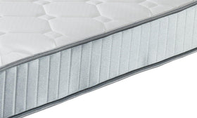 Side edge close-up of the Sleep Rest Bonnell spring mattress showing the quilted top layer and ribbed silver-grey border fabric