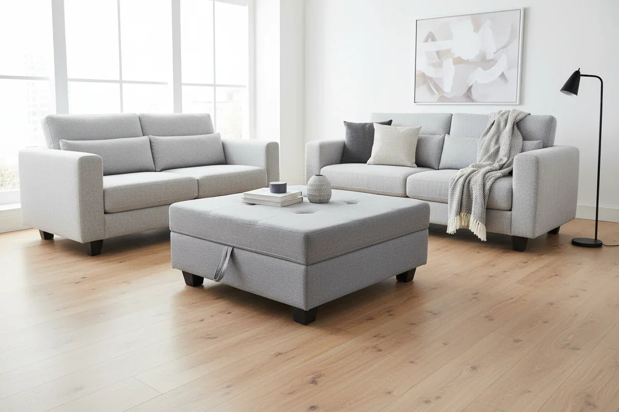 Gray sofa set with ottoman in a bright living room