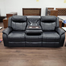 Sunshine black air leather three-seater recliner sofa with fold-down centre console, cup holders and charging dock, shown in showroom
