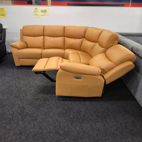 Sussex Leather Corner Lounge with Recliners in tan viewed from the side in The A2Z Furniture showroom, one recliner extended with the button control visible on the outer arm