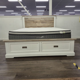 Tasman Storage Bed Frame in off-white finish with open storage drawers in the footboard, on display in The A2Z Furniture showroom (mattress shown not included).
