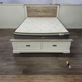 Tasman Storage Bed Frame with off-white panel frame and brown textured wood-look headboard, on display in The A2Z Furniture showroom (mattress shown not included).