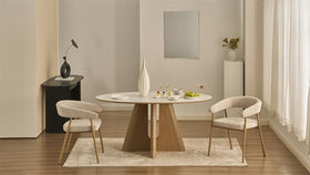 Cypress round dining table with Mila chairs in a dining room